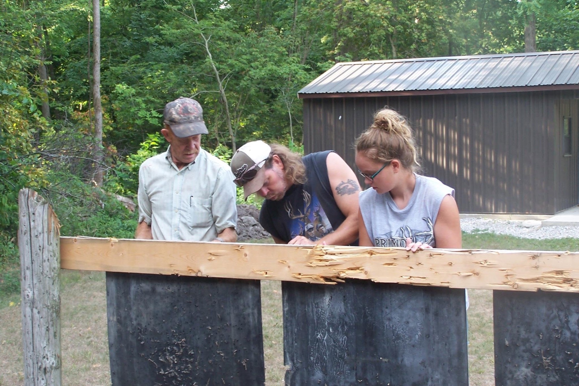 Members framing a new shooting station on the range